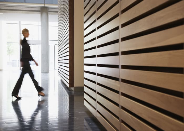 Businesswoman walking in corridor