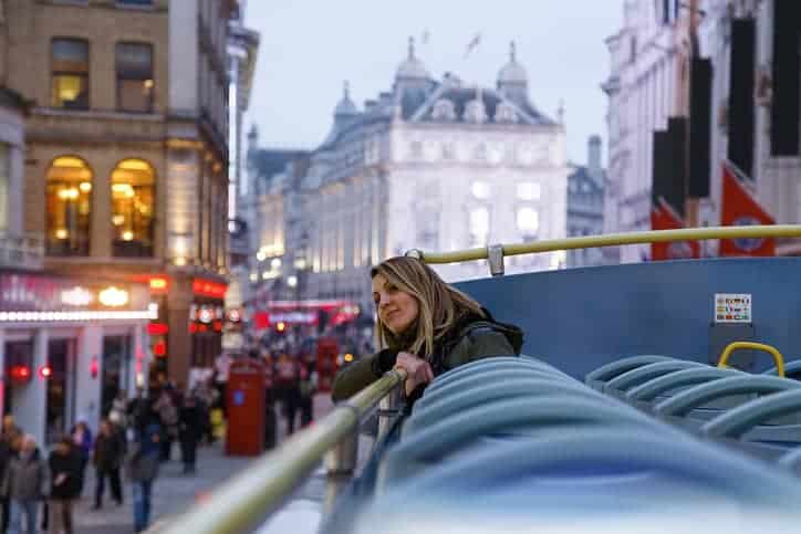 Tourist take a bus tour in London