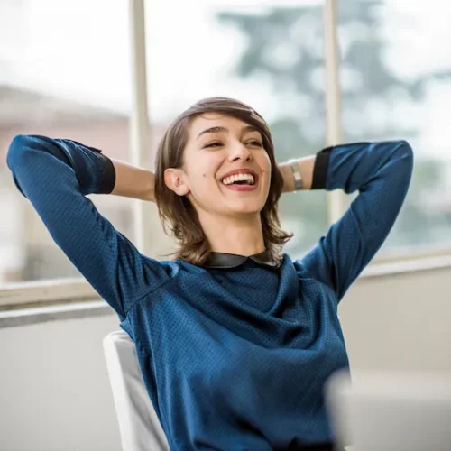 Woman smiling after relocation of company